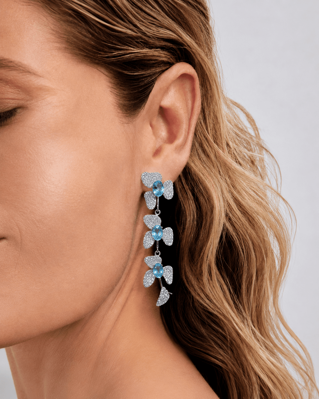 Petals in Flight Sterling Silver 925 Sky Blue Topaz Earrings